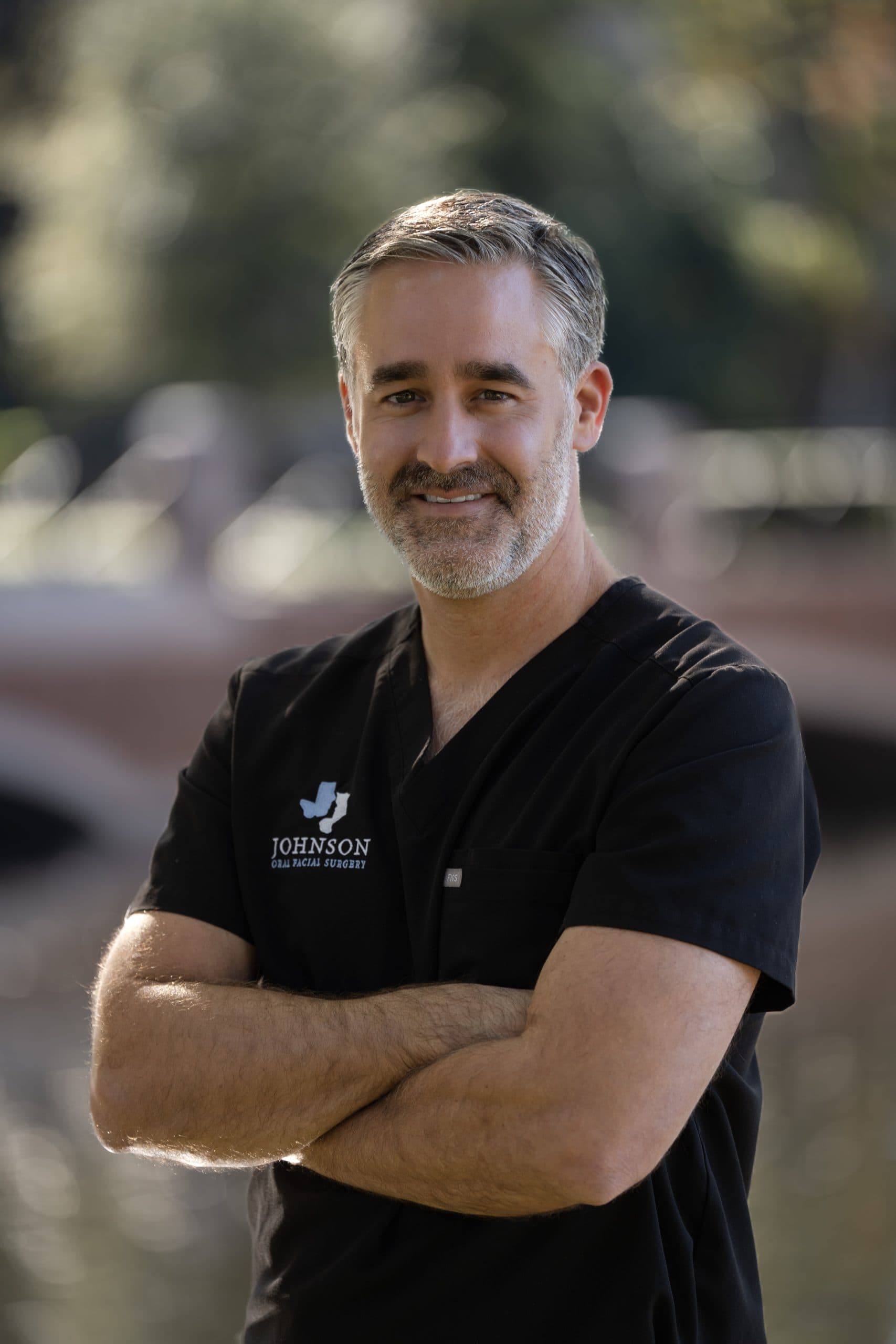 Dr. Chris Johnson, board-certified oral and maxillofacial surgeon